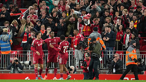 Liverpool's Alexander Isak, center, celebrates with teammates after scoring the opening goal of his team during the English League Cup third round soccer match between Liverpool and Southampton on Tuesday, Sept. 23, 2025.