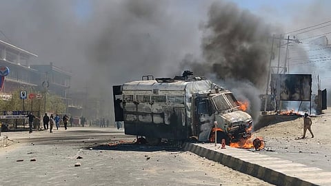 A police vehicle is set on fire during a protest by locals demanding statehood, in Ladakh, Wednesday, Sept. 24, 2025