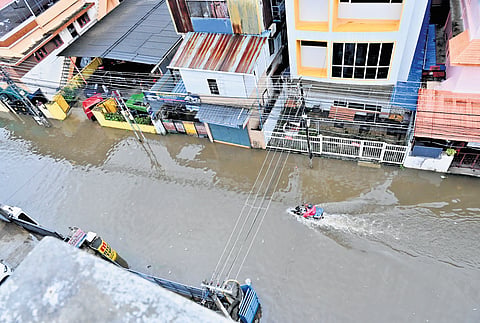 A waterlogged Kuriyathy Road. Several homes in the area were inundated, while traffic remained disrupted