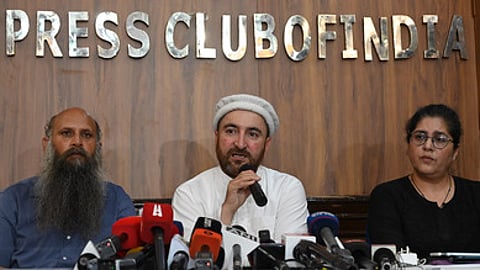 In this file photo from Sept. 29, 2025, Kargil Democratic Alliance (KDA) leader Sajjad Kargili (centre) addresses a press conference in New Delhi.