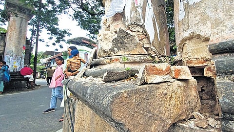 The pillar at Vadakekotta (North Fort) severely damaged after a trailer crashed into it on Saturday morning
