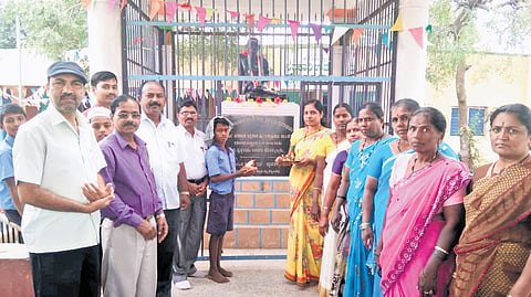 Residents of Jakkali village in Gadag district pray to Mahatma Gandhi in a temple dedicated to him
