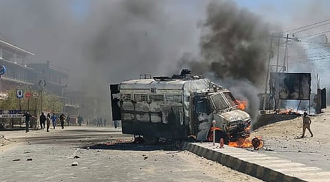 Security personnel stand guard on a road amid curfew, days after violence during protests for Ladakh statehood, in Leh,