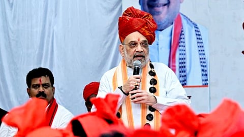 Union Home Minister Amit Shah addresses the gathering during Muria Darbar, a traditional event held as part of the Bastar Dussehra festival, in Bastar district, Chhattisgarh.