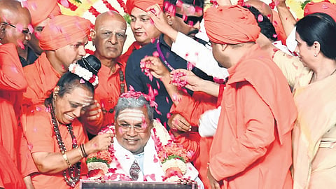 CM Siddaramaiah being felicitated during Basava Samskruti Abhiyana-2025 at Palace Grounds in Bengaluru on Sunday