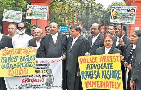 Advocates demand the arrest of advocate Rakesh Kishore for throwing a shoe
at CJI BR Gavai, in Bengaluru on Wednesday