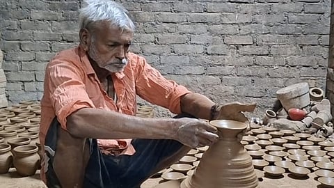 A potter in Kumhar Mandi