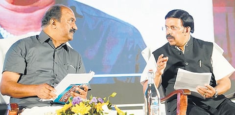 K R Jyothilal, Additional Chief Secretary, Finance (right), makes a point with Finance Minister K N Balagopal during ‘Vision 2031’ in Kochi on Monday