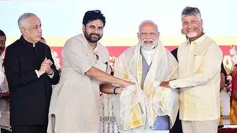 PM Narendra Modi felicitated by CM Chandrababu Naidu, Deputy CM Pawan Kalyan, and Governor Abdul Nazeer.