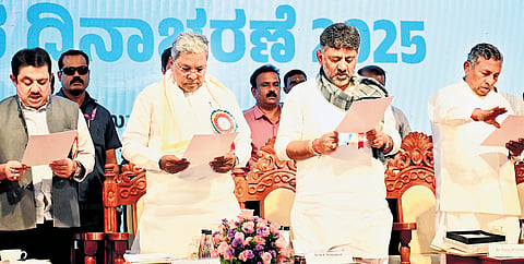 Chief Minister Siddaramaiah, DCM DK Shivakumar, and ministers KH Muniyappa and BZ Zameer Ahmed Khan take a pledge against wasting food on the occasion of World Food Day in Vidhana Soudha in Bengaluru on Thursday