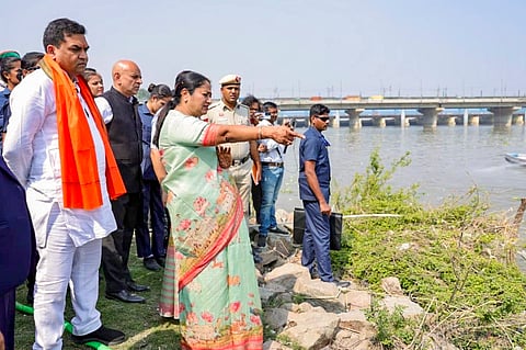 Delhi Chief Minister Rekha Gupta, accompanied by officials and party leaders, inspects cleanliness and rejuvenation efforts along the Yamuna River ahead of the Chhath festival, at Kalindi Kunj, in New Delhi.