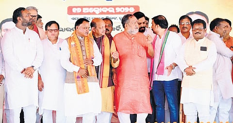 CM Mohan Majhi with party candidate Jay Dholakia and other leaders at a poll rally in Nuapada