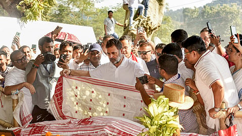 Leader of Opposition Rahul Gandhi performs rituals as he pays tribute to late singer Zubeen Garg at his resting place in Sonapur, on the outskirts of Guwahati, Assam, Friday, Oct. 17, 2025.