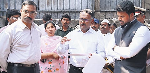 The committee members speak to cracker blast survivors in Rayavaram