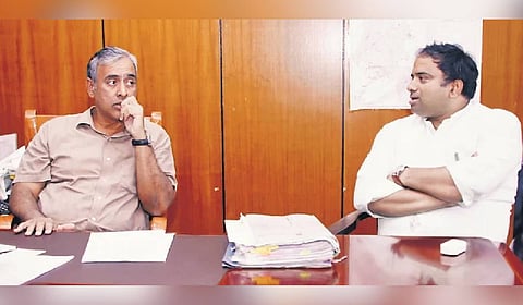 GBA Chief Commissioner M Maheshwar Rao (L) directed officials of corporations to work in close coordination and ensure completion of pending projects and civic works.