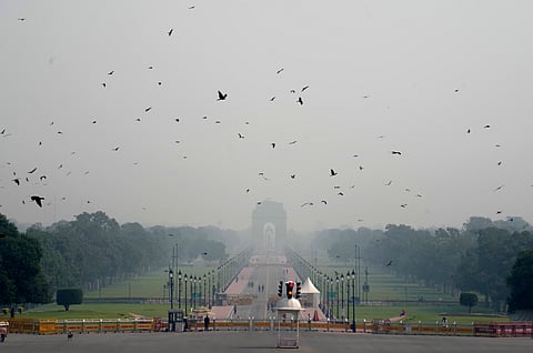 India Gate engulfed in a layer of smog, in New Delhi, Monday, Oct. 20, 2025. The national capital woke up to a layer of smog on Diwali morning with the city's air quality index (AQI) slipping into the 'very poor' category, as it crossed the 300-mark.