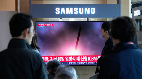 A TV screen shows a file image of North Korea's missile launch during a news program at Seoul Railway Station in Seoul, South Korea.