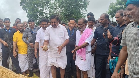 AIADMK general secretary Edappadi K Palaniswami inspecting the paddy kept in the open by the farmers outside the DPCs in Thanjavur and Tiruvarur districts.