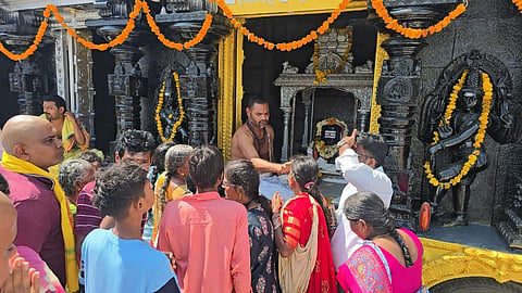 When darshan break temporly devotees have darshan at temple replica at Sri Raja Rajeshwara Swamy temple, Vemulawada in Rajanna-Sircilla district on Wednesday.