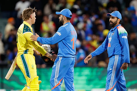 Rohit Sharma (R) scored a fifty against Australia while Virat Kohli is yet to get going