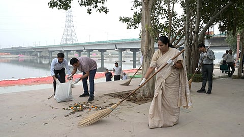 Delhi Chief Minister Rekha Gupta participates in the cleanliness drive at Vasudev Ghat Yamuna river a day after Chhath puja