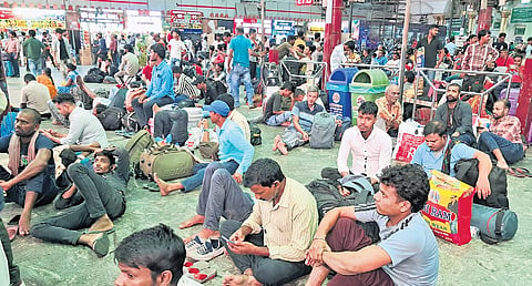 Hundreds of migrant workers waiting at Chennai Central on Tuesday.