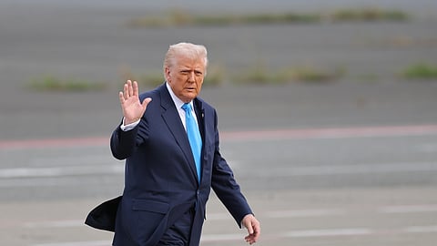 U.S. President Donald Trump walks towards Air Force One at Haneda Airport in Tokyo for his departure to South Korea, Wednesday, Oct. 29, 2025.