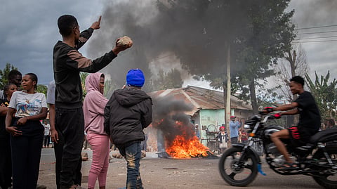 People protest in the streets of Arusha, Tanzania, on election day Wednesday, Oct. 29, 2025.