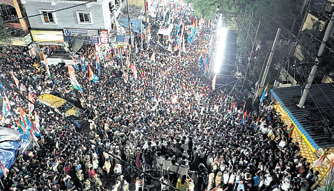 A mammoth crowd gathers around the campaign vehicle of Chief Minister A Revanth Reddy during his roadshow in Jubilee Hills Assembly constituency on Friday.