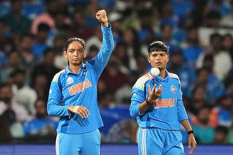 India's captain Harmanpreet Kaur, left, speaks with India's Kranti Goud during the ICC Women's Cricket World Cup final match between India and South Africa in Navi Mumbai, India, Sunday, Nov. 2, 2025.