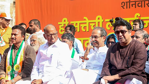 In this photo from Nov 01, 2025, MNS Chief Raj Thackeray (R), Shiv Sena (UBT) Chief Uddhav Thackeray (C) and NCP (SP) Chief Sharad Pawar (2-L) protest against the Election Commission's inaction on electoral roll registration in Mumbai.