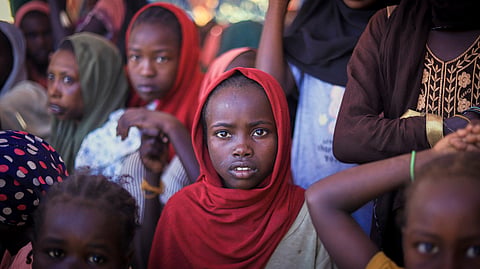 This photo, released by the Norwegian Refugee Council (NRC), shows displaced women and children from el-Fasher at a camp where they sought refuge from fighting between government forces and the RSF in Tawila, Darfur region, Sudan, Monday, Nov. 3, 2025.