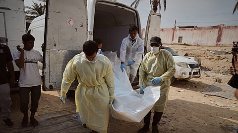 Bodies of unidentified Palestinians returned from Israel as part of the ceasefire deal are brought to Nasser Hospital in Khan Younis, Gaza Strip, Monday, Nov. 3, 2025.