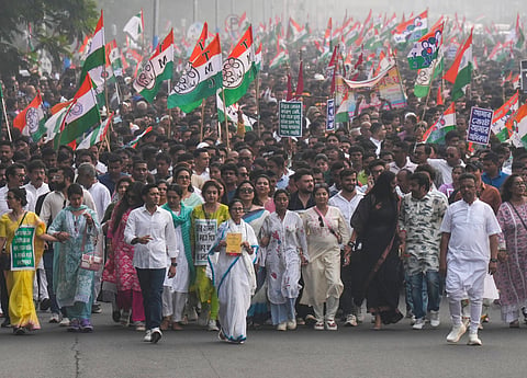 FILE - West Bengal CM and TMC supremo Mamata Banerjee with the party's General Secretary and MP Abhishek Banerjee and other party leaders takes part in a protest rally against SIR.