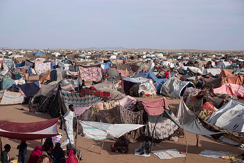 Makeshift shelters erected by displaced Sudanese who fled El-Fasher after the city fell to the Rapid Support Forces (RSF), make up the Um Yanqur camp, located on the southwestern edge of Tawila, in war-torn Sudan's western Darfur region on November 3, 2025.