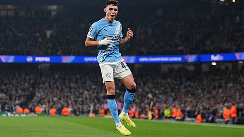 Manchester City's Phil Foden celebrates scoring their third goal during the Champions League opening phase match against Borussia Dortmund, Wednesday, Nov. 5, 2025, in, Manchester, England.