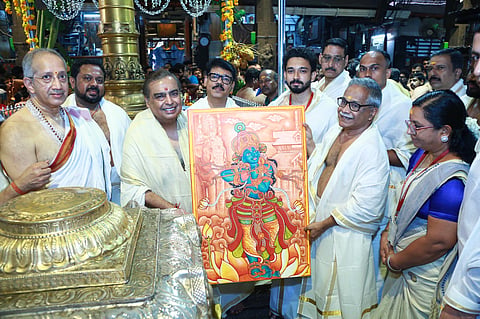 was received by Devaswom Chairman Dr. V.K. Vijayan, Governing Body Member C. Manoj, and Administrator O.B. Arun Kumar, and was felicitated with a ponnadai (shawl) and also gifted a mural painting as a token from the Devaswom.