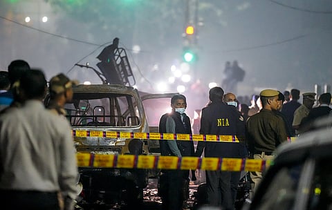 National Investigation Agency (NIA) team at the spot after a blast occurred in a parked car near Red Fort.