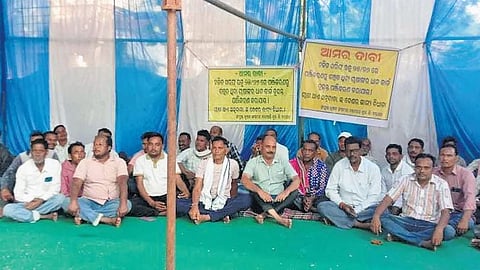 Farmers staging protest in front of the Bargarh collectorate on Tuesday