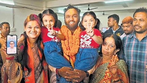 Jay Dholakia with his family members after his victory in Nuapada bypoll