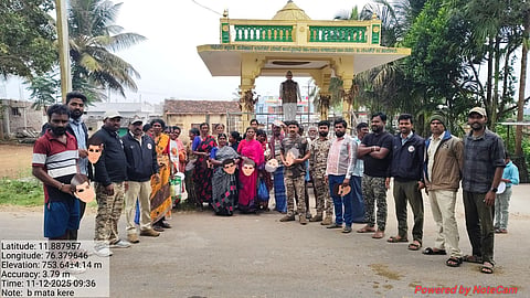 Forest officials distribute masks to villagers on the fringes of Bandipur and Nagarahole Tiger Reserves