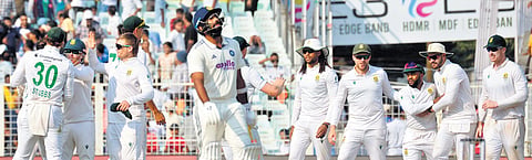 South Africa players celebrate their win over India in the first Test at Kolkata on Sunday.