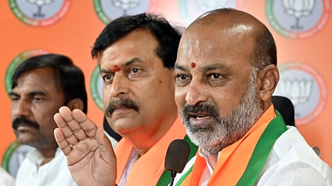 The Union minister alleged both parties fought only for the cameras and proposed a public debate on Telangana's debt, Gurukul tenders and corruption.