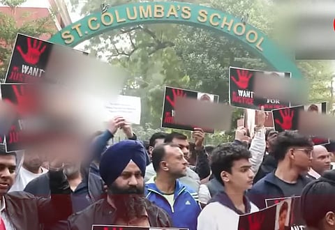 The protesters demanded strict action against the teachers who allegedly harassed him.