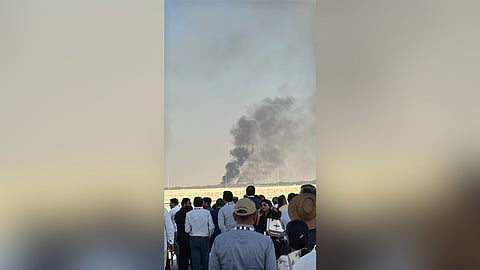 Black smoke rising over the Al Maktoum International Airport in Dubai as the crowd of spectators witnessed the crash.