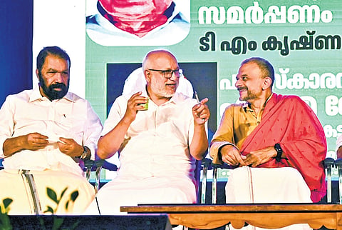 CPM general secretary M A Baby and P Govinda Pillai Memorial National Award winner T M Krishna at the award ceremony at University Senate Hall, Thiruvananthapuram, on Saturday. Education Minister V Sivankutty is
also seen