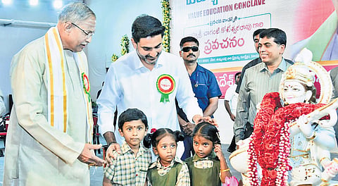 Education Minister Nara Lokesh and Advisor to Government of AP, Chaganti Koteswara Rao, at the Value Education Conclave at Tummalapalli Kalashetram in Vijayawada on Monday. HRD Minister Nara Lokesh is also seen