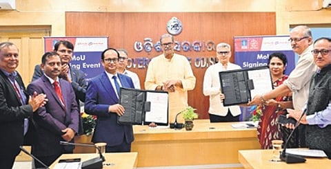OPTCL, UBI signing the MoU in presence of dy CM KV Singh Deo on Monday