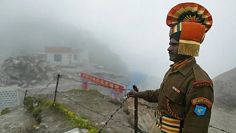 A soldier standing guard near the McMahon line