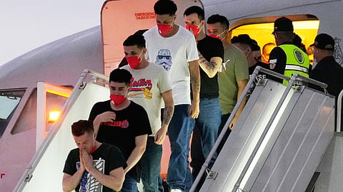 Migrants deported months before by the United States to El Salvador under the Trump administration's immigration crackdown arrive at Simon BolĂvar International Airport in Maiquetia, Venezuela, July 18, 2025.